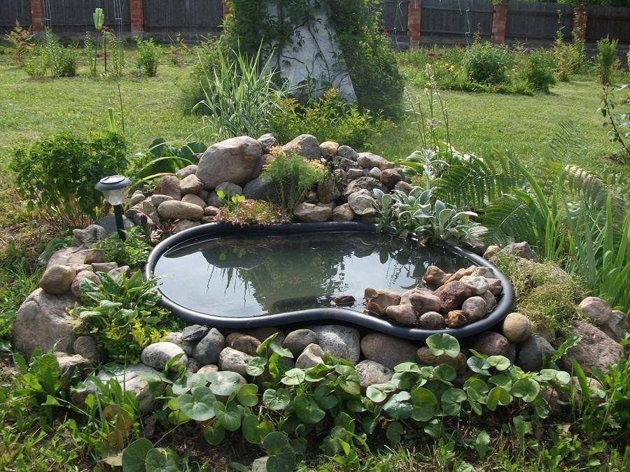 Каменные горки в саду фото